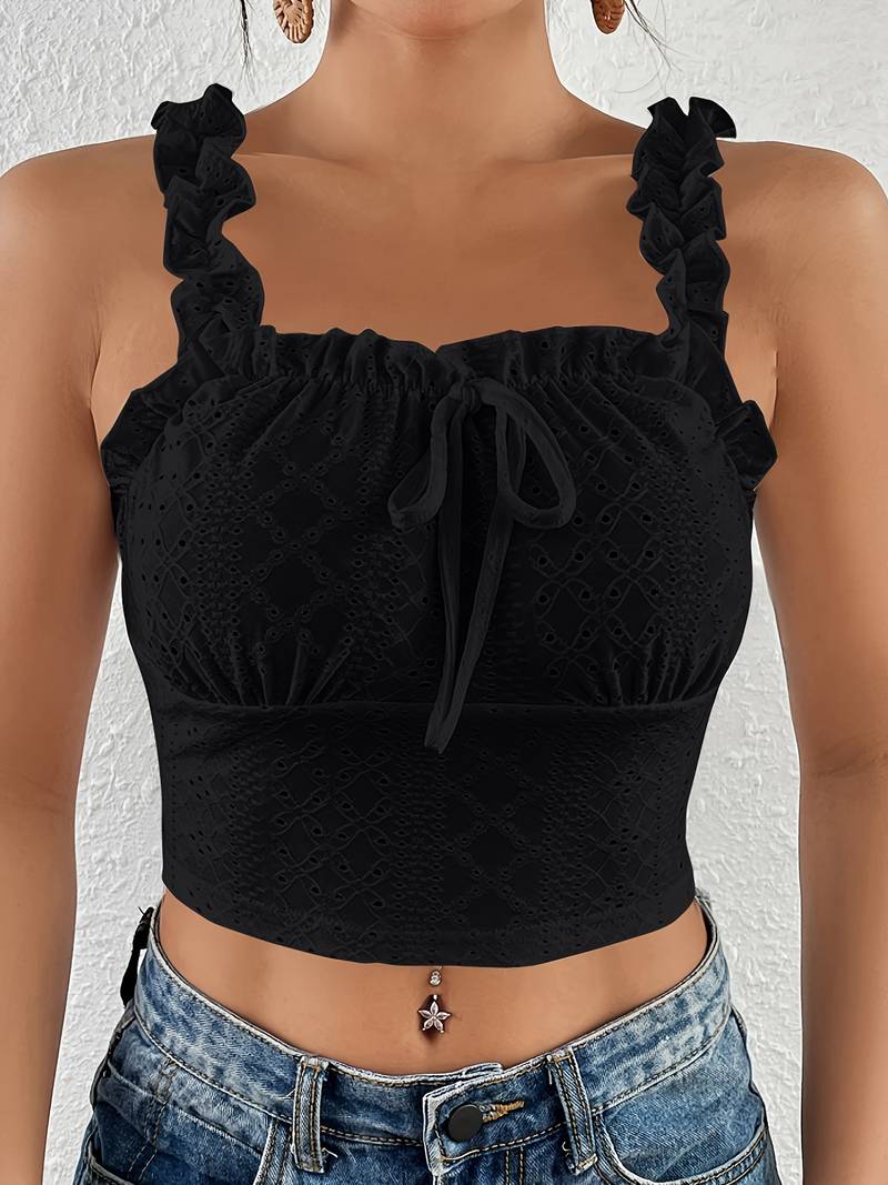 Top met eyeletveters en geschulpte zoom