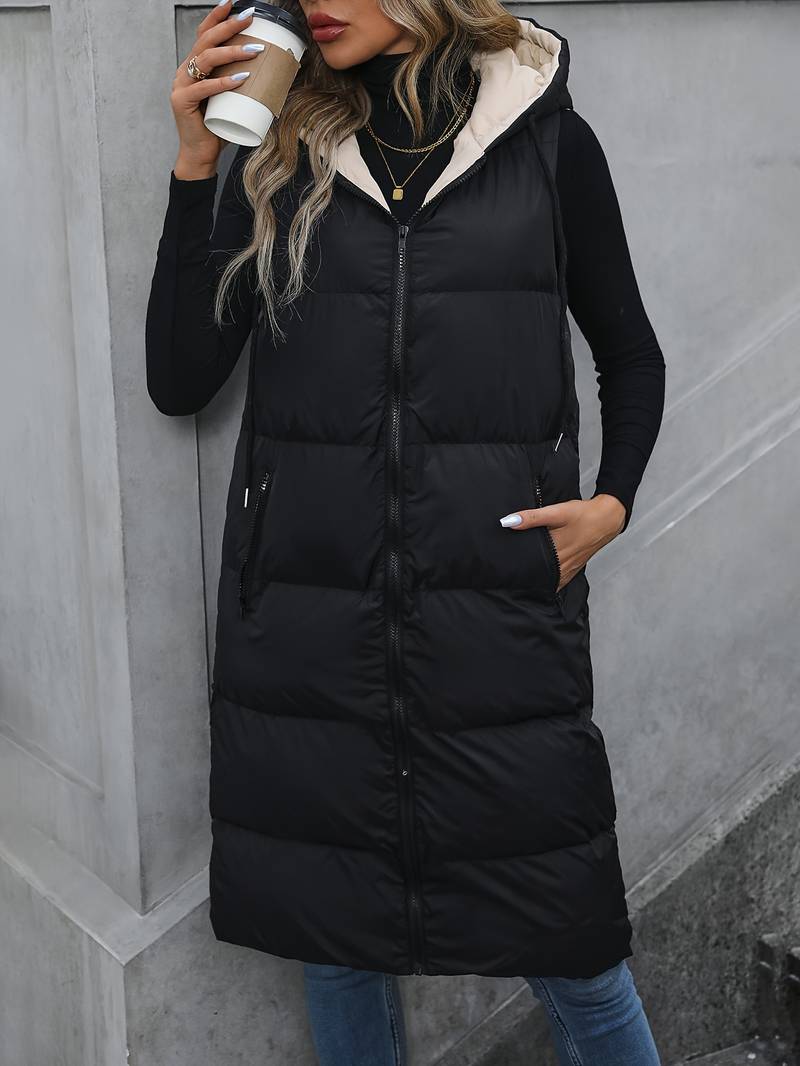 Aina | Lang gewatteerd mouwloos vest met capuchon voor dames - lichtgewicht bodywarmer vest