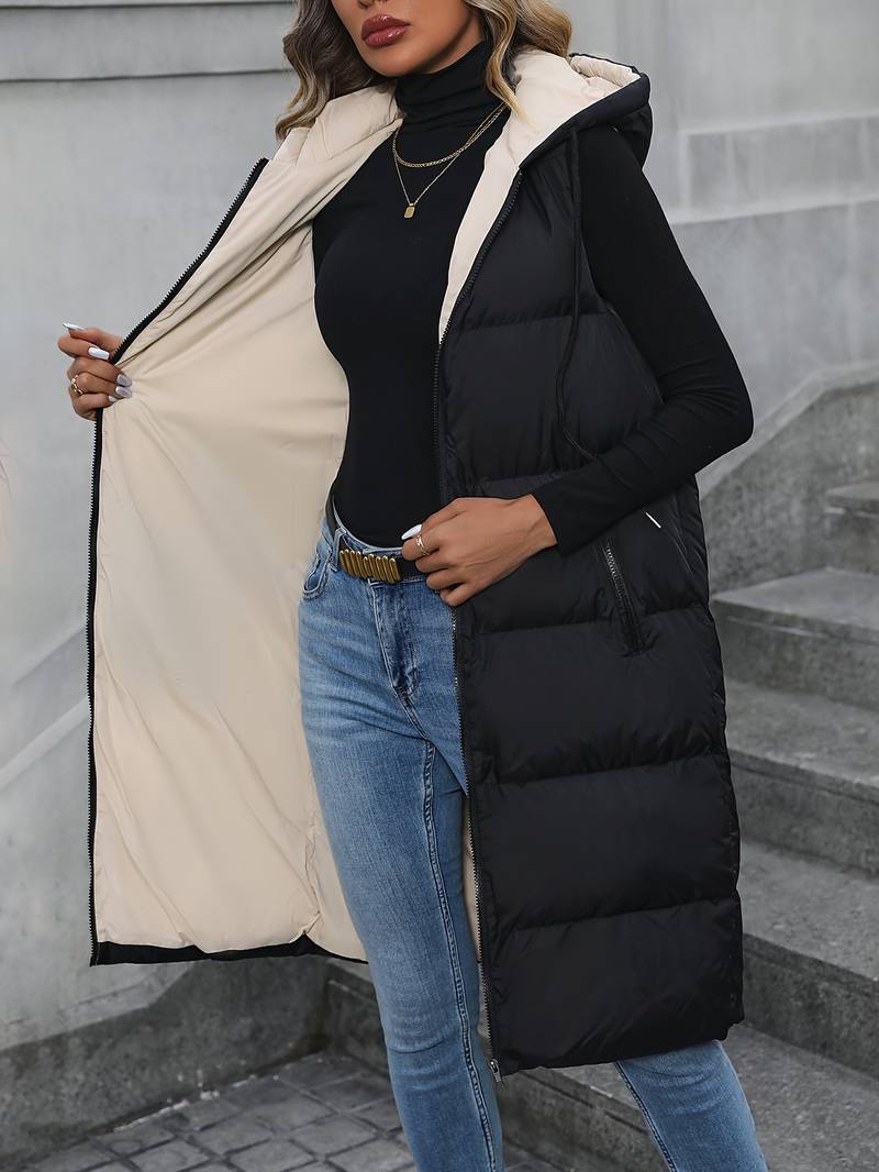 Aina | Lang gewatteerd mouwloos vest met capuchon voor dames - lichtgewicht bodywarmer vest