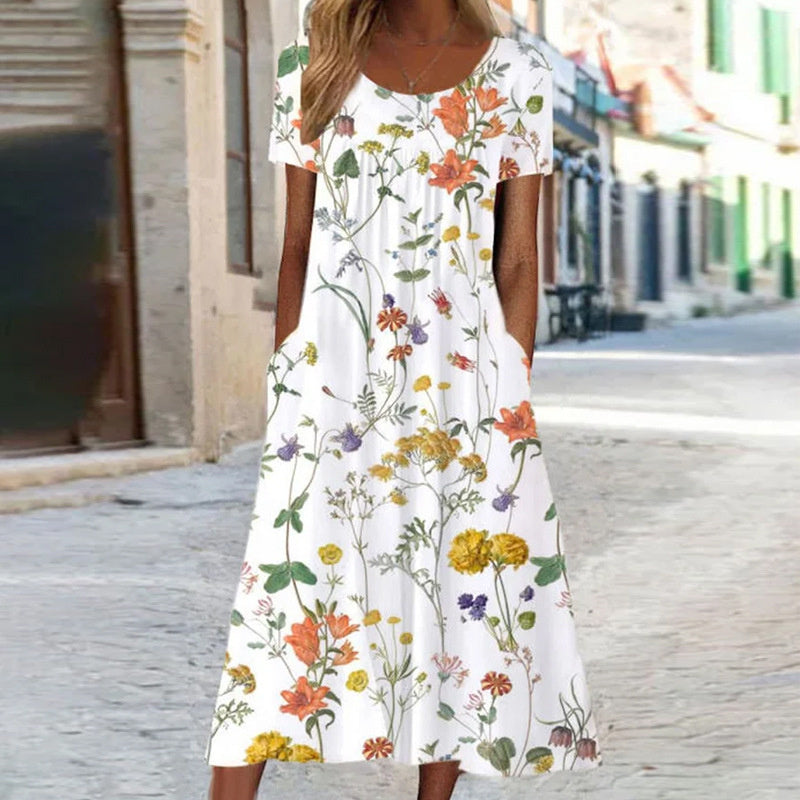 Pomi | Zomerjurk met bloemenprint voor dames – Midi-jurk met losse pasvorm die de buik bedekt