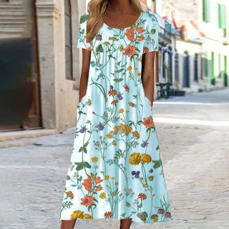 Pomi | Zomerjurk met bloemenprint voor dames – Midi-jurk met losse pasvorm die de buik bedekt