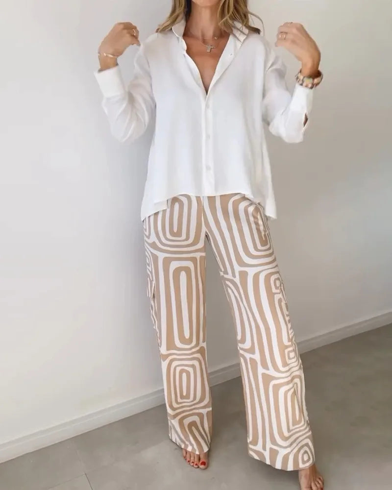 Taerisse | Elegante damesoutfit - wit overhemd met lange mouwen en wijde broek met beige geometrische print
