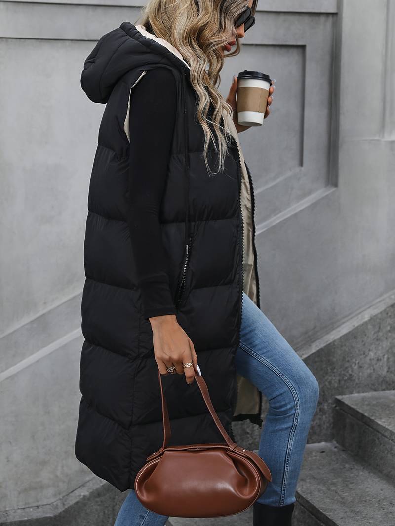 Aina | Lang gewatteerd mouwloos vest met capuchon voor dames - lichtgewicht bodywarmer vest