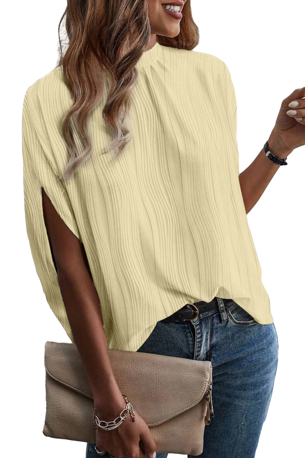 Tonia | Golvende blouse met structuur en hoge halslijn